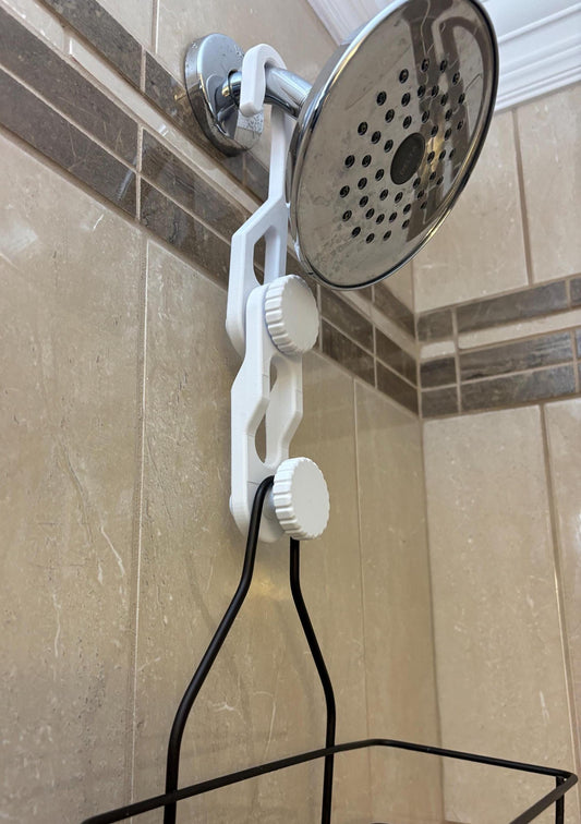 Dual-knob white shower caddy extension hanger installed on rain shower head
