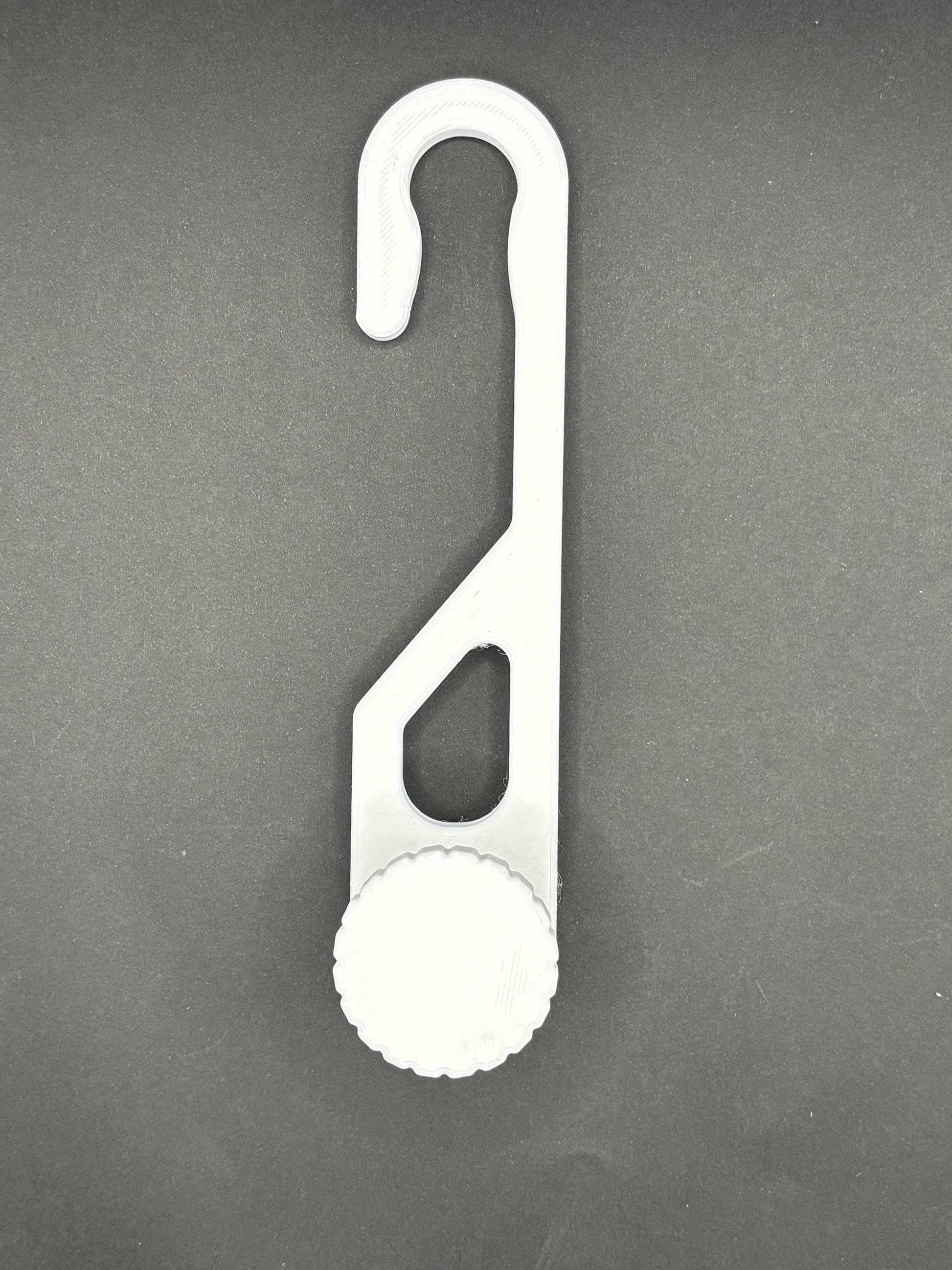 Standard-hook white shower caddy extension hanger with adjustment knob in studio lighting on black background.