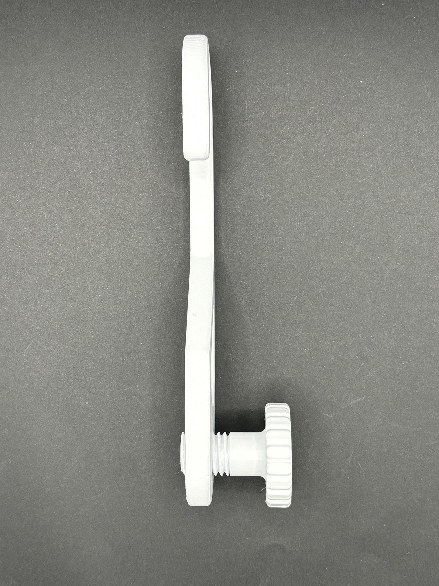 Standard-hook white shower caddy extension hanger with adjustment knob in studio lighting on black background_Side_view.