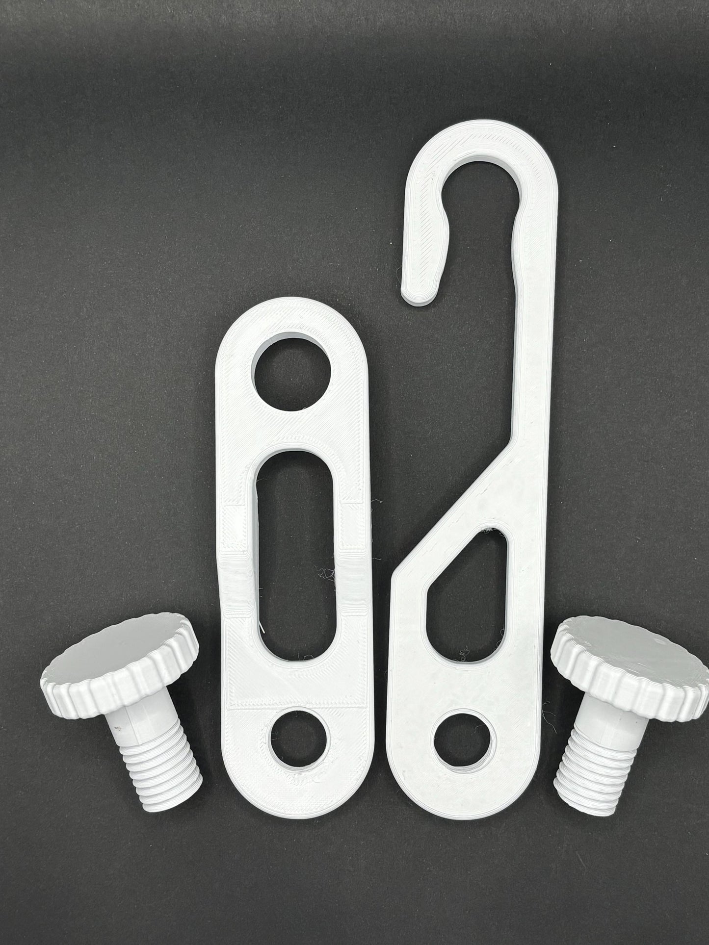 Dual-knob white shower caddy extension hanger studio parts lay out, includes standard hanger, 4.5inch additional extender and hanging knobs.