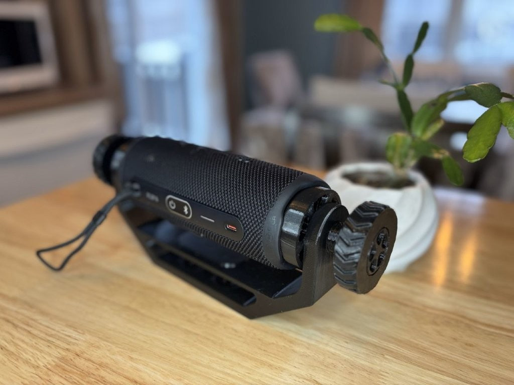 Adjustable speaker mount suitable for wall mount, deck mount, ATV, UTV, and side-by-side vehicles, designed to hold for JBL Flip 6 style speaker securely with black trim package