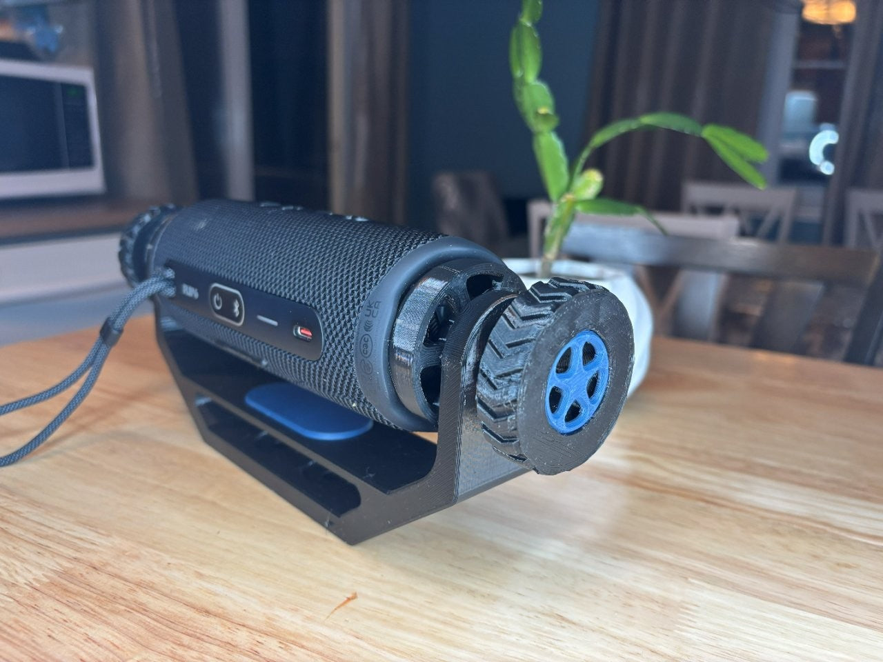 Adjustable speaker mount suitable for wall mount, deck mount, ATV, UTV, and side-by-side vehicles, designed to hold for JBL Flip 6 style speaker securely with blue trim package 