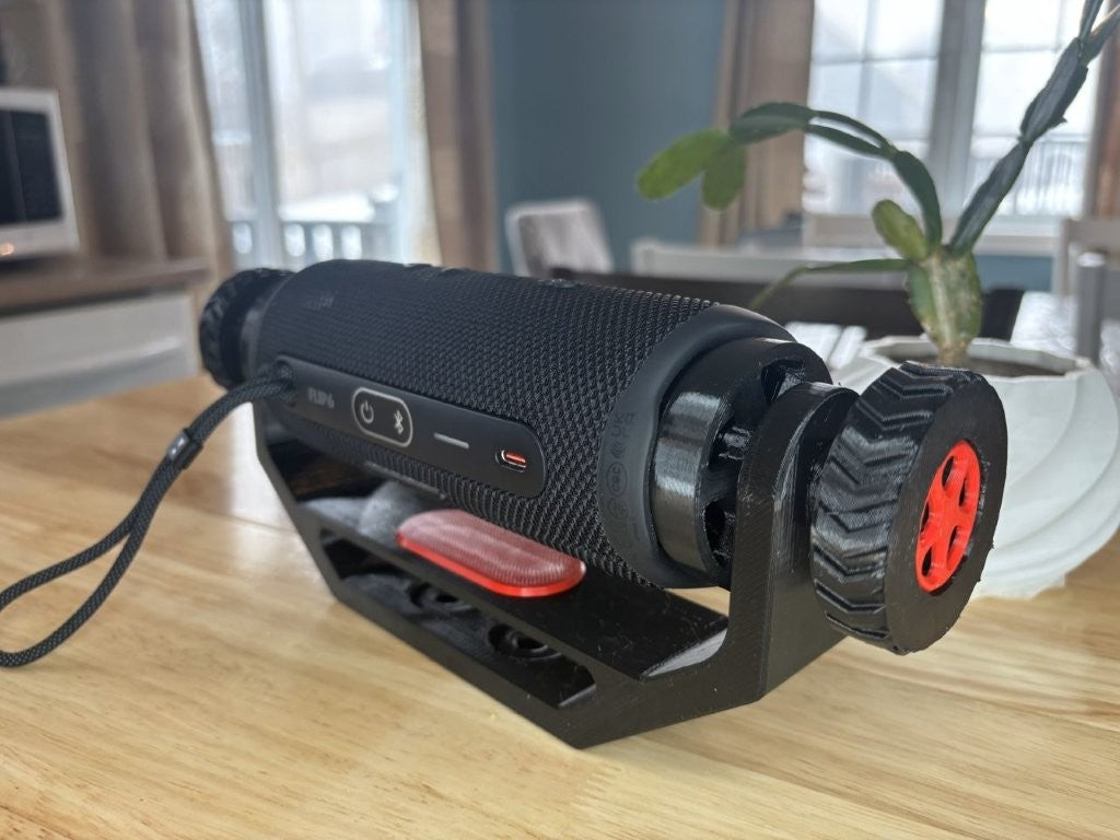 Adjustable speaker mount suitable for wall mount, deck mount, ATV, UTV, and side by side vehicles, designed to hold for JBL Flip 6 style speaker securely with red trim package