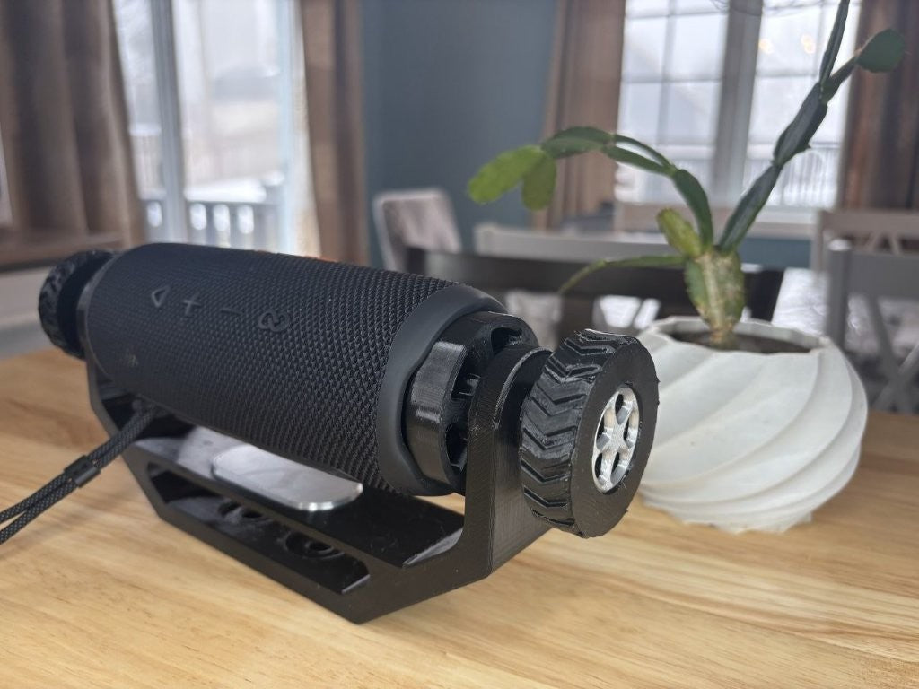 Adjustable speaker mount suitable for wall mount, deck mount, ATV, UTV, and side-by-side vehicles, designed to hold for JBL Flip 6 style speaker securely with grey trim package