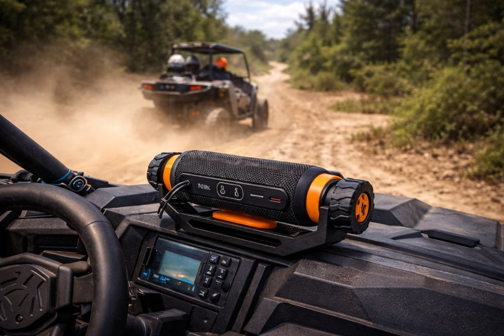 ATV-mounted adjustable speaker mount holding a JBL Flip 6 style on utv atv side by side off roading