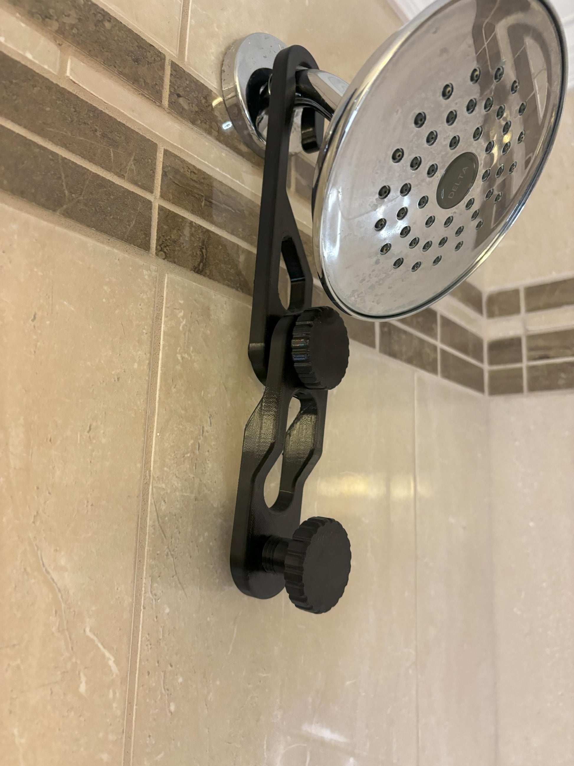 Dual-knob black shower caddy extension hanger installed on rain shower head with additional extender simple installed