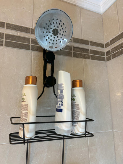 Dual-knob black shower caddy extension hanger installed on rain shower head shelf access increased