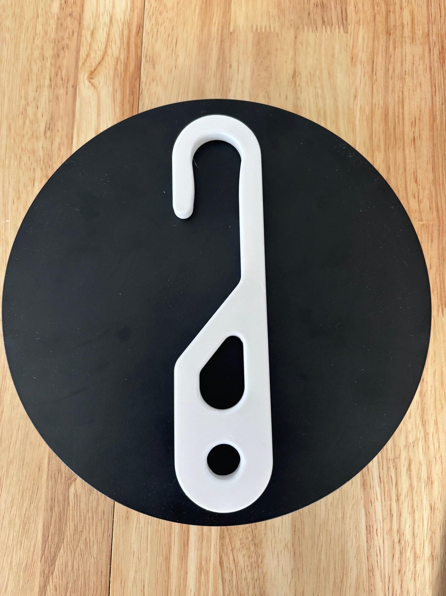 Wide-hook white shower caddy extension hanger – 3D printed – front view on black background